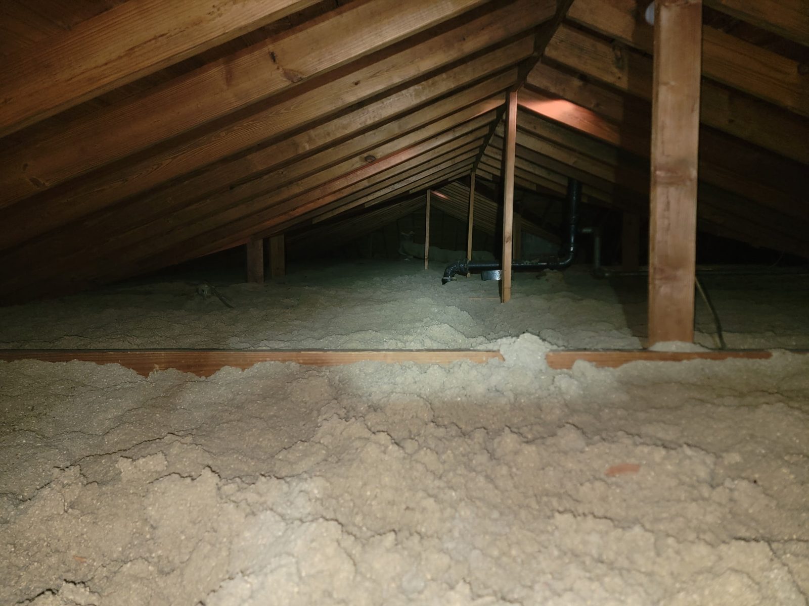 Contaminated attic insulation before removal in a central Indiana home