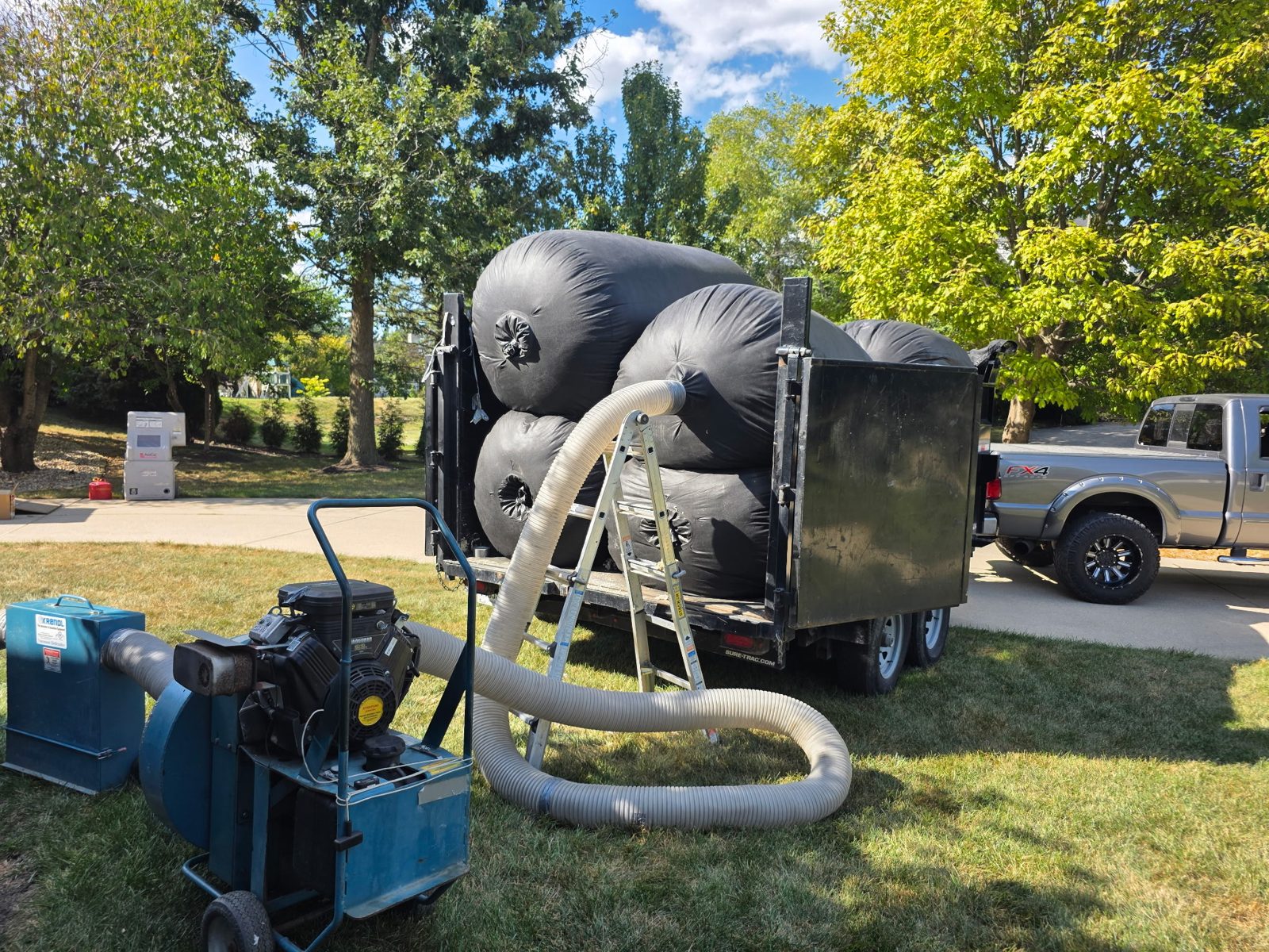 Trailer loaded with bags of removed contaminated insulation