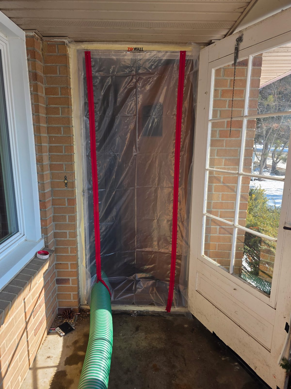 ZipWall containment protecting the home during attic work